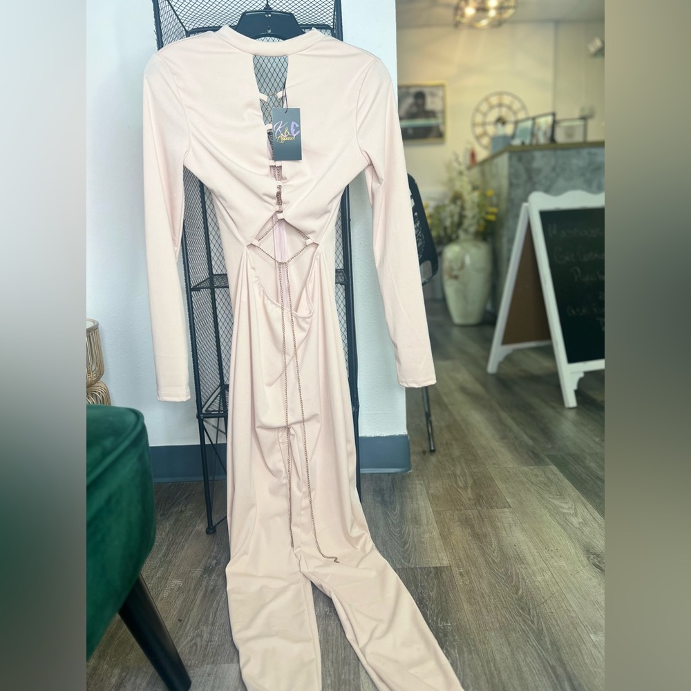 Jumpsuit w/chain laced openings